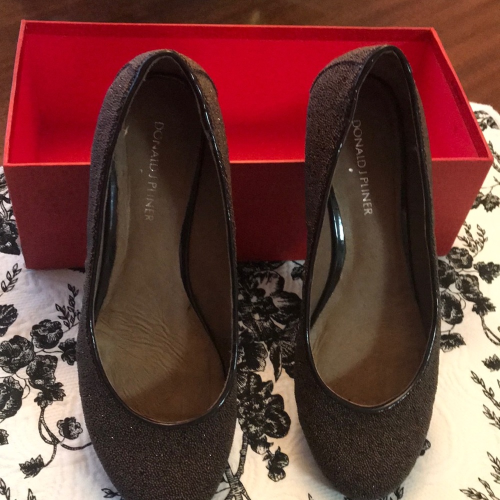 Donald Pliner flats with a 1” wedge round toe
